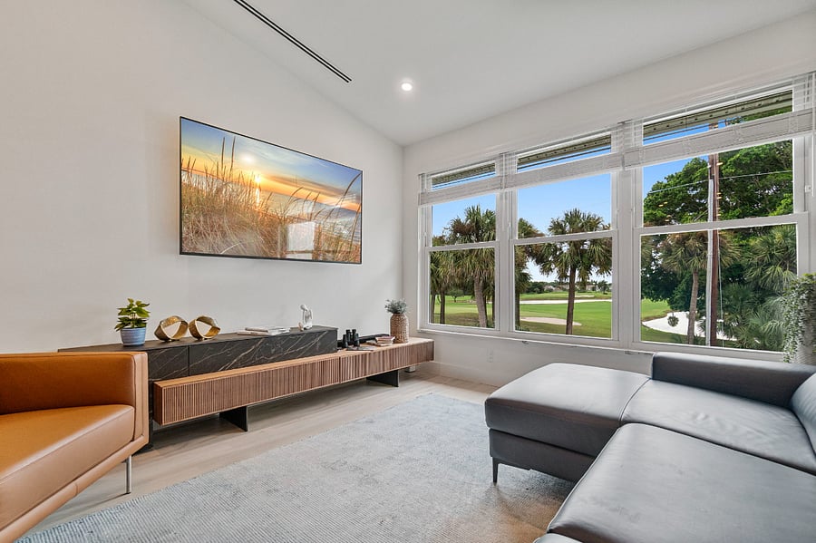 Living Room With All New Leather Seating, Smart TV and View of the Golf Course and Lakes