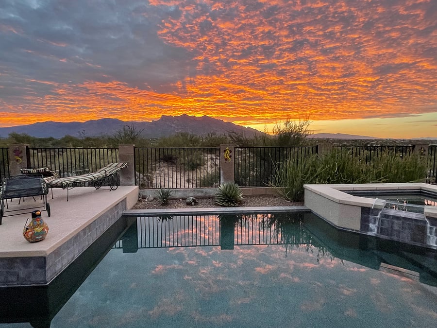 Pool with raised lounge area. Sunrise