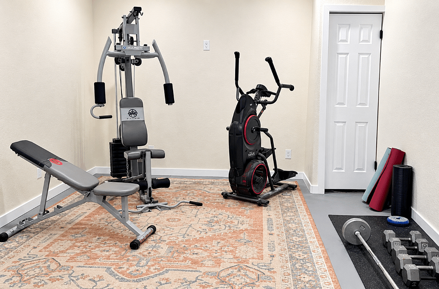 Workout equipment: Bowflex, elliptical/stair stepper combo, free weights, bench