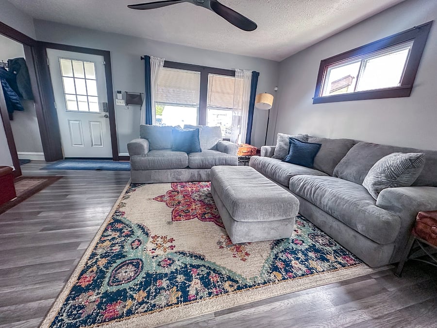 Front door entrance, and shared living room space.