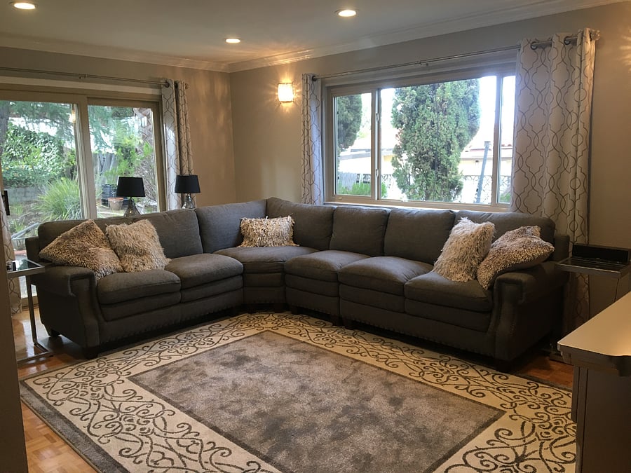 Downstairs family room with large screen TV.
