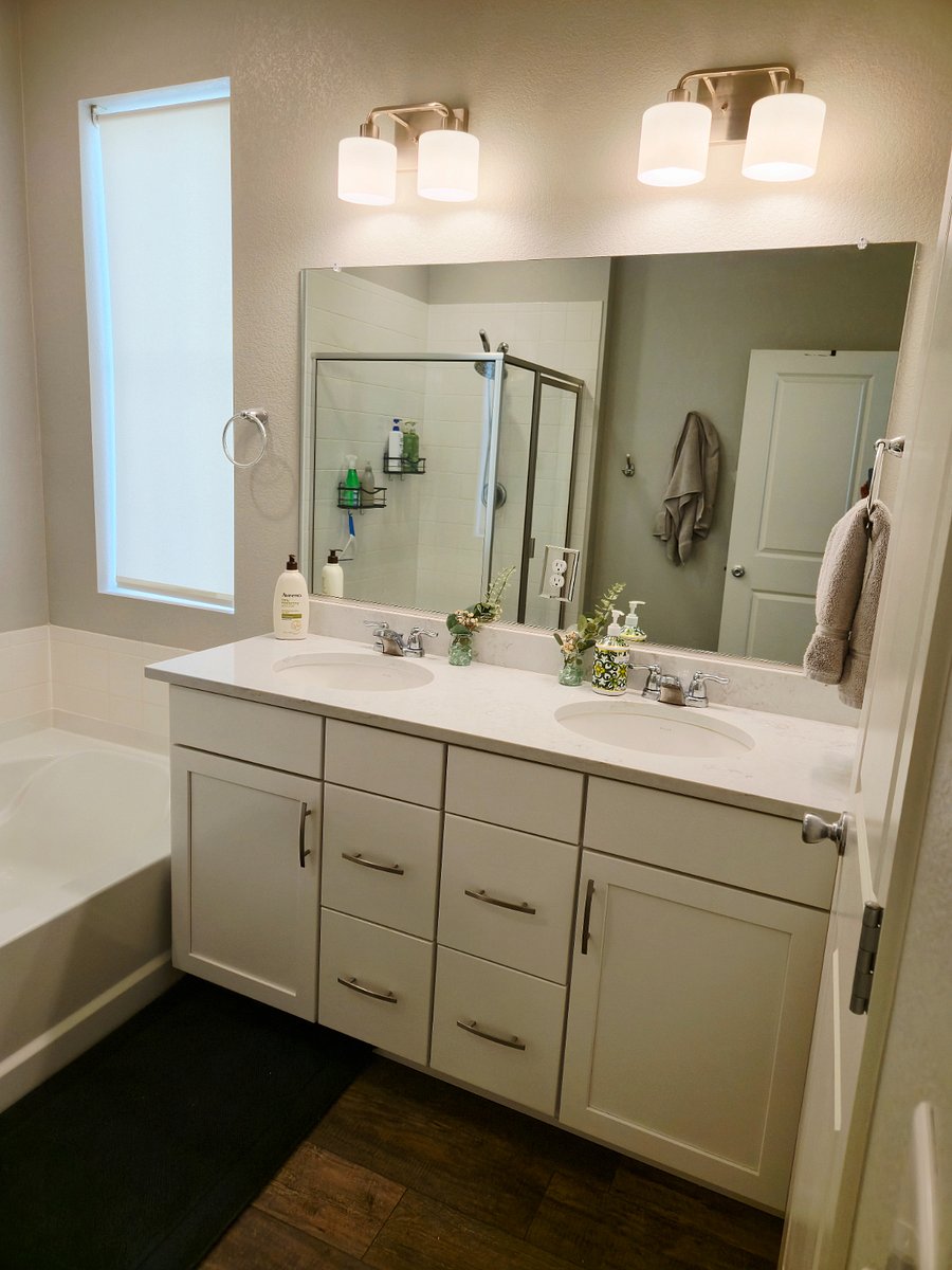 Two sink bathroom vanity in master bath with ample storage