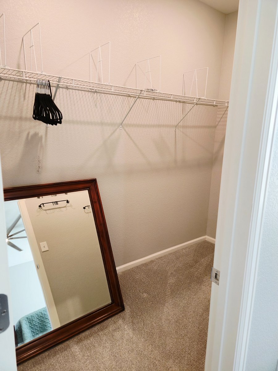 Walk in closet in master bedroom