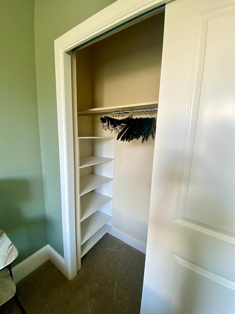 Bedroom Closet w/built-in shelves & hangers