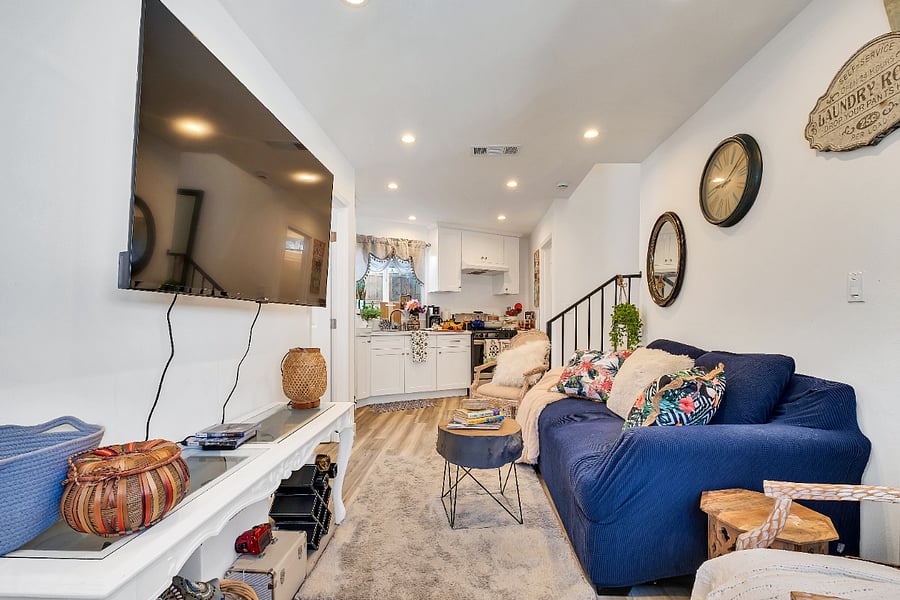 Cozy living room featuring a 55" Smart TV with DirecTV/Cable, Netflix, You Tube & Video Games perfect for unwinding after a day of exploring