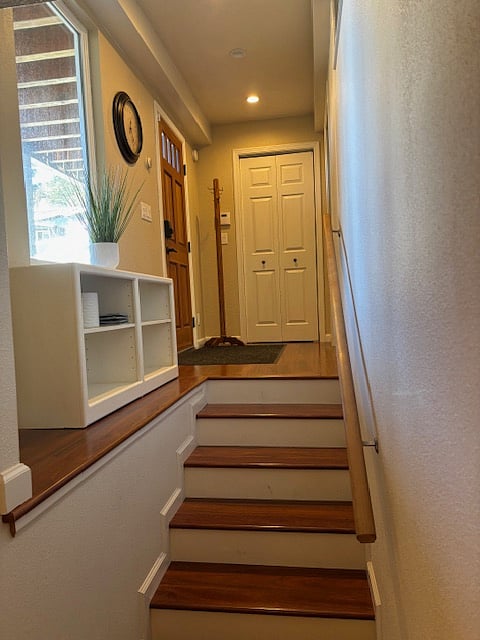 Stairway to Apartment Entrance with Bedroom on the right.