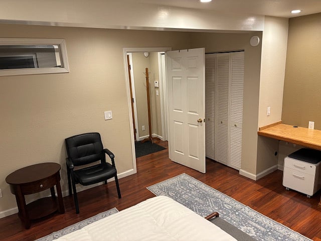 Sitting Area and closet of Large Bedroom