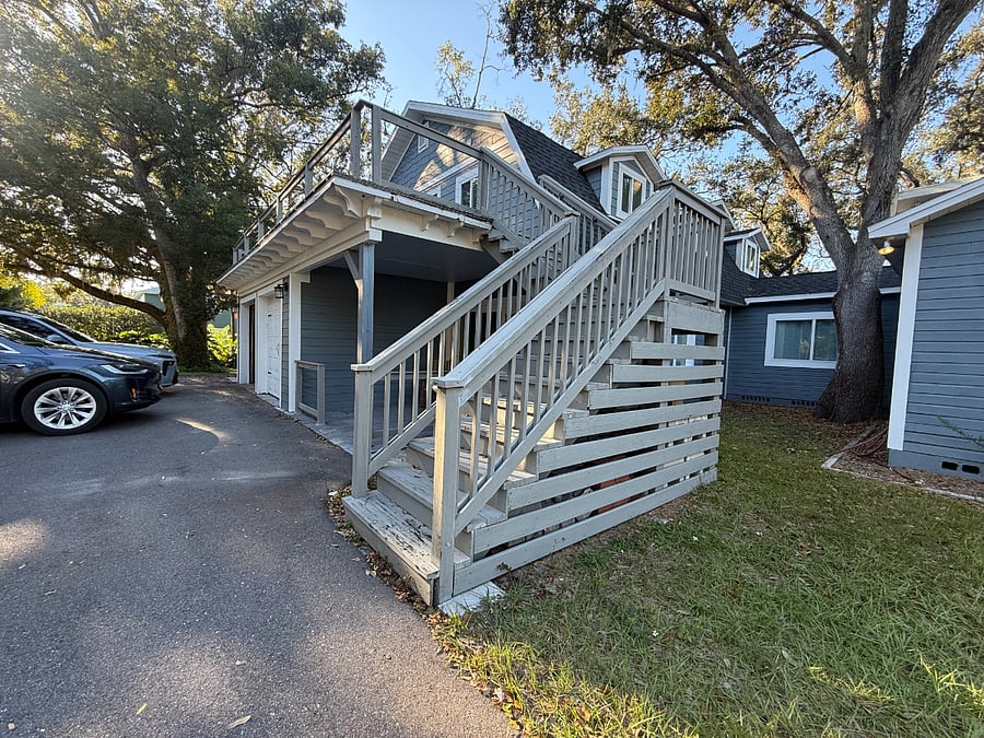 Villa is upstairs over the garage. 