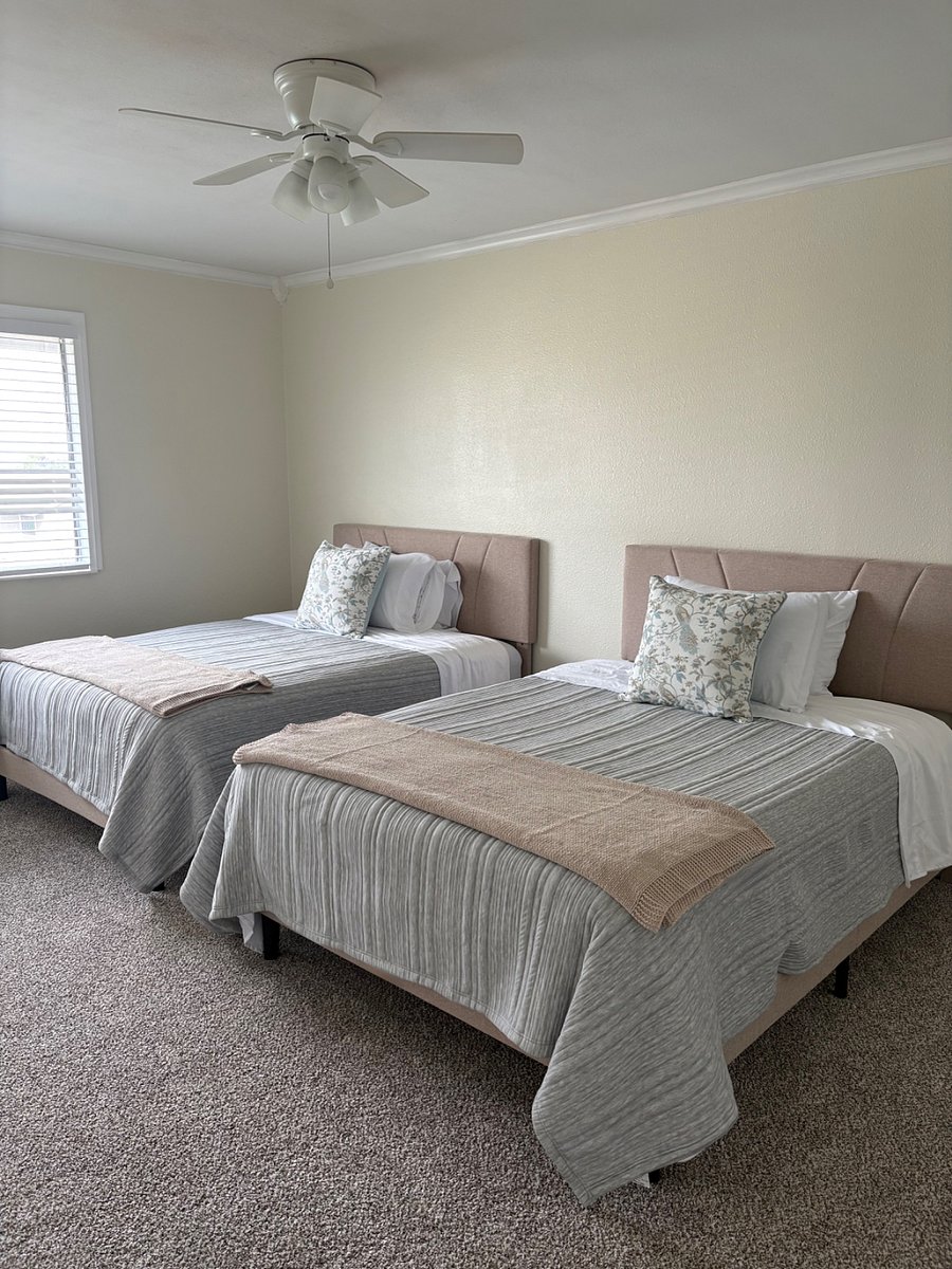 Two full beds with ample closet storage