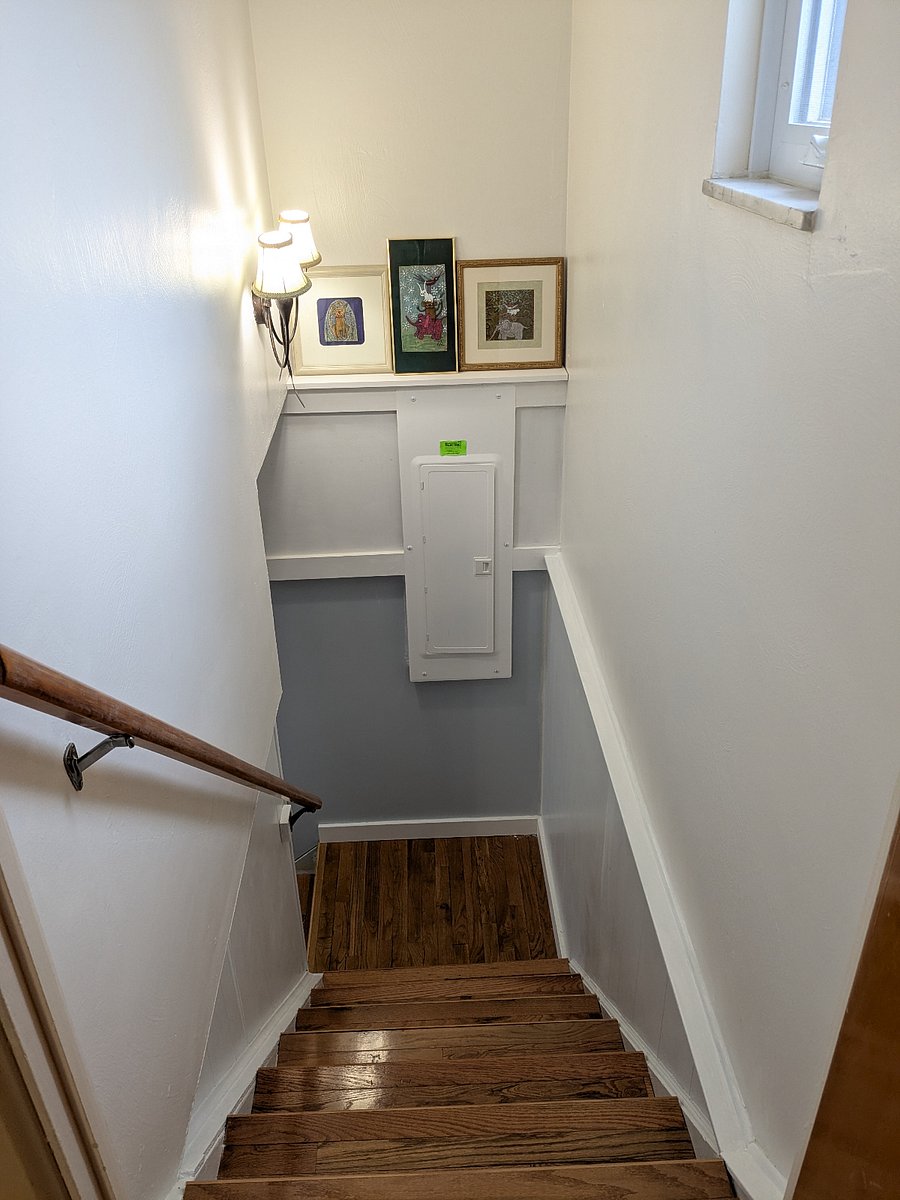 stairs leading to game room and  other full bathroom