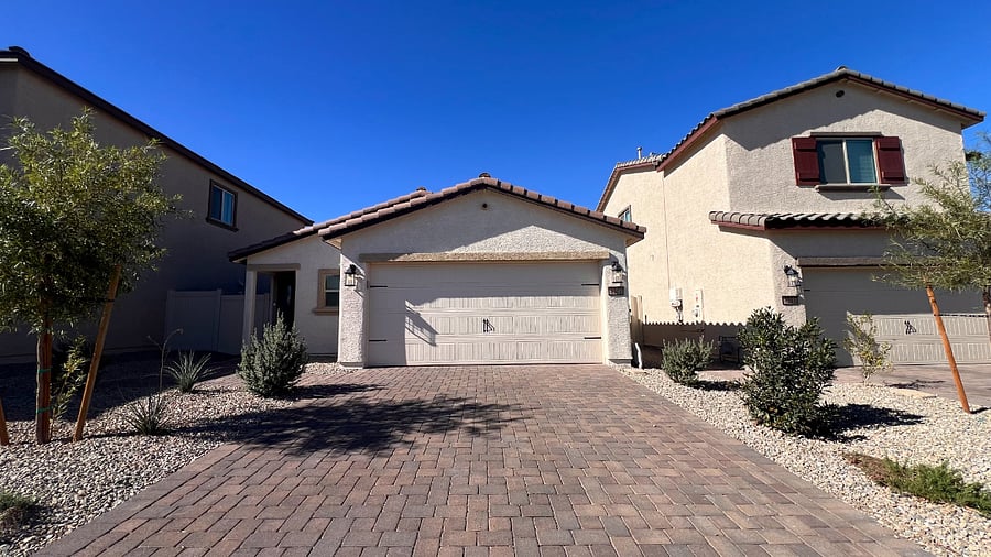 Front of the house with two outdoor parking garage.