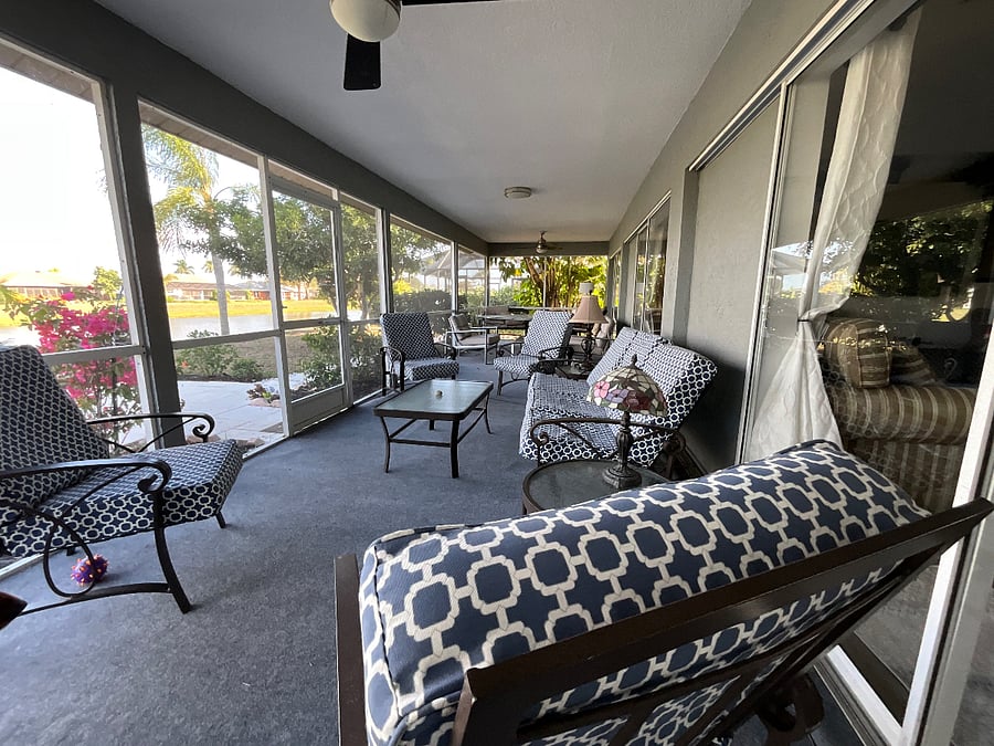Screened in lanai with pateo furniture for relaxing or napping. Barbeque for the steaks and burgers on the lanae