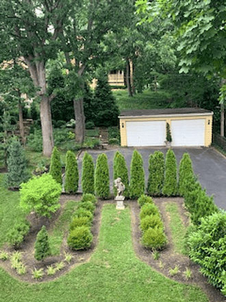 Parking pad in gated backyard