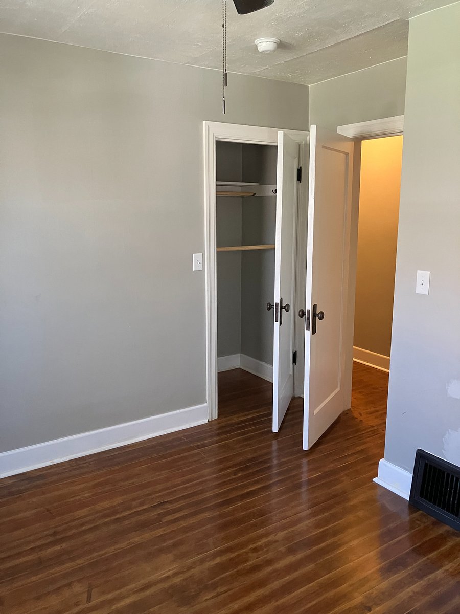 The bedroom is relatively small, as they were in the 1920's but this unit has a nice closet and bright windows with room darkening drapes.