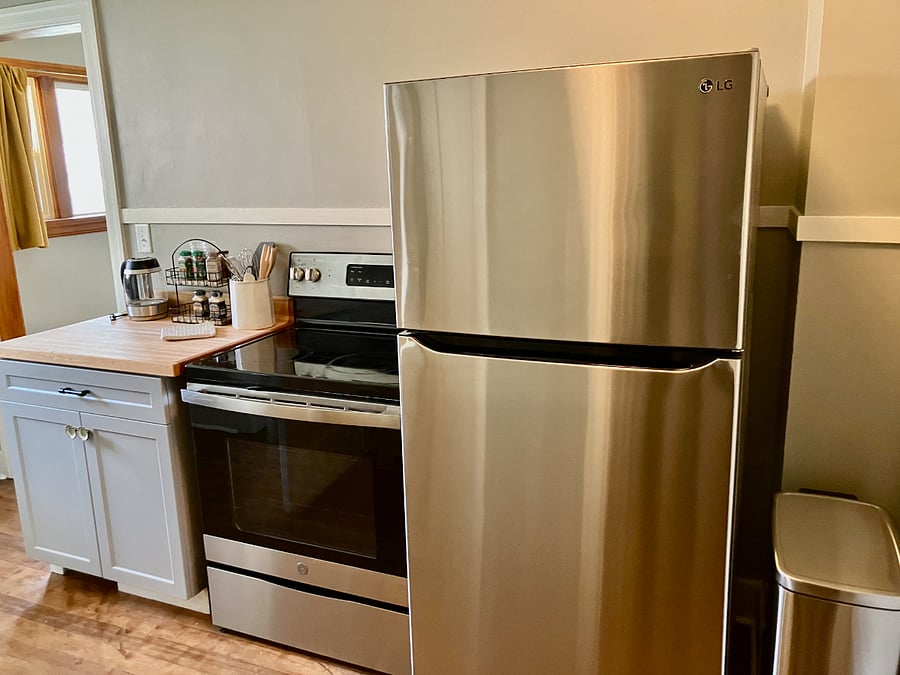 Kitchen is equipped with full-size appliances and everything you need to cook/bake at home.