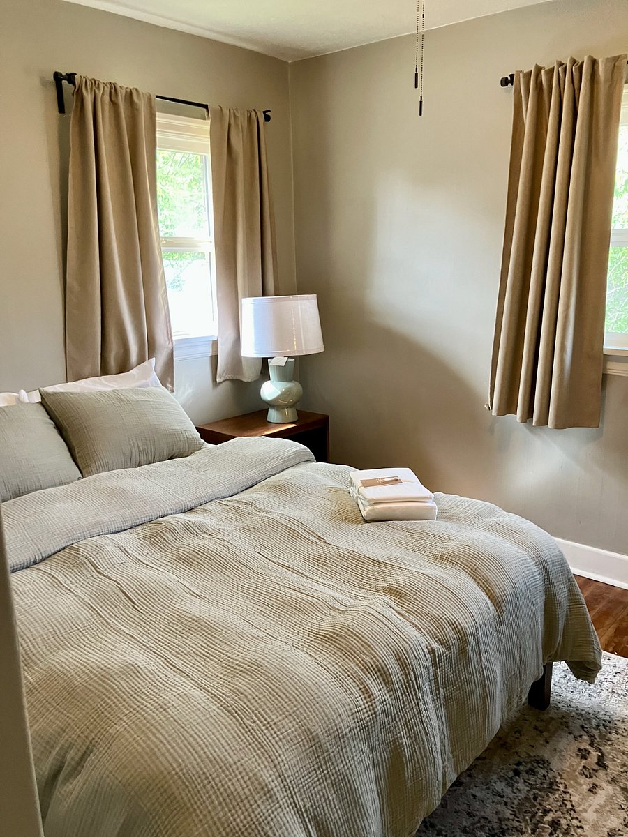 West Elm linens for a restful sleep. Comfy pillows and room darkening drapes.