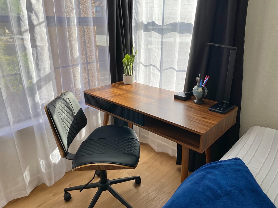 A stylish mid-century modern workstation makes it easy to stay productive. Fast, reliable Wi-Fi keeps you connected, while a multi-outlet charging station helps keep all your devices powered.