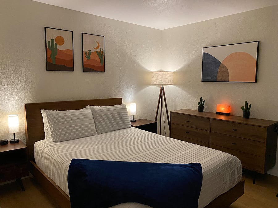 As evening sets in, layered lighting creates a warm and calming atmosphere ideal for light reading, decompressing, and drifting off to a restful night's sleep.