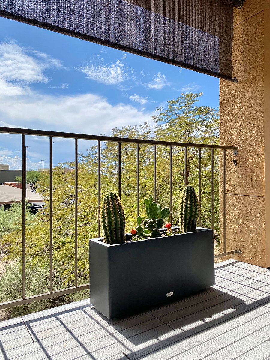 With the shades raised, enjoy open views, fresh air, and Tucson sunshine from this elevated balcony overlooking La Encantada. Experience a greater sense of privacy as no neighbors or common areas face the balcony. 