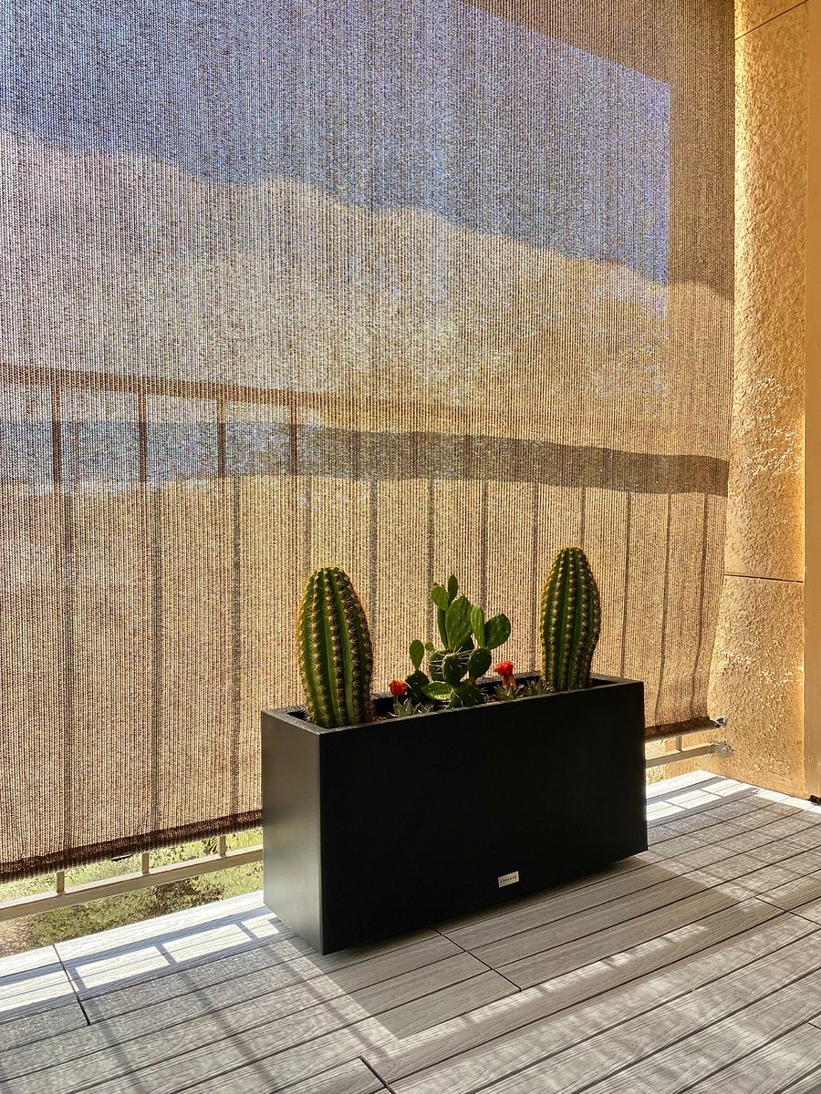 When the afternoon sun arrives, lower the shades to create a cooler, more private outdoor retreat without giving up the fresh air.