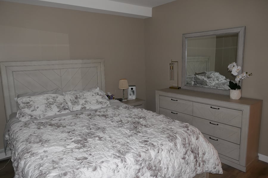 Brand new bedroom set with dresser and end table.