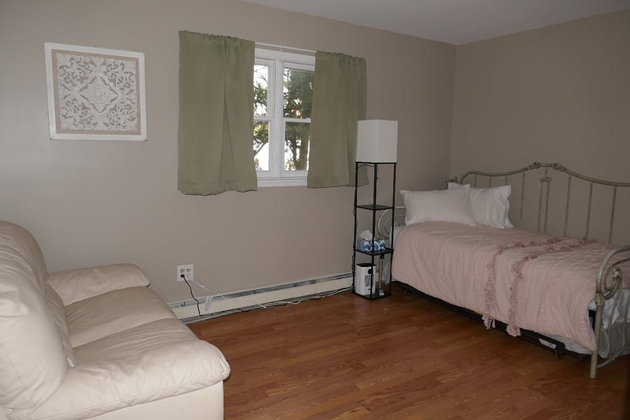 Mini Suite with day bed, trundle bed (wheel stoppers provided), couch, and dresser.