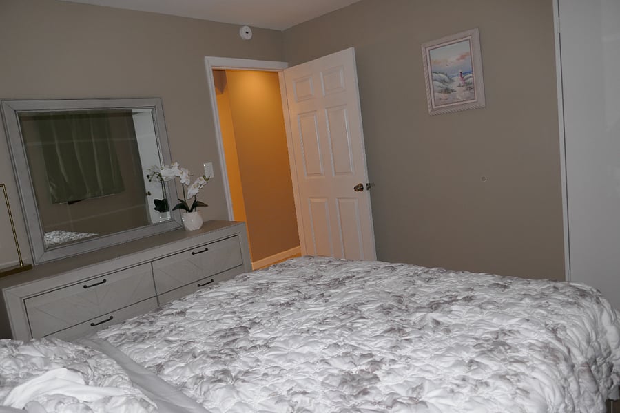 Brand new bedroom set with dresser and end table.