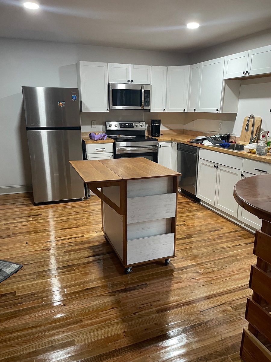 Fully stocked kitchen with island and optional extra dining space