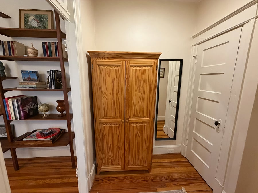 Linen & Supply Closet outside bathroom.