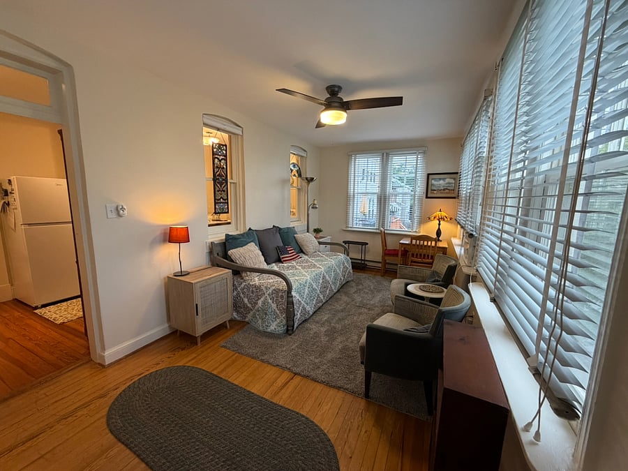 Bedroom 2  with seating and small table or workspace