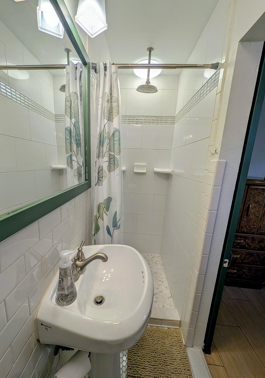 Shower with rainfall showerhead