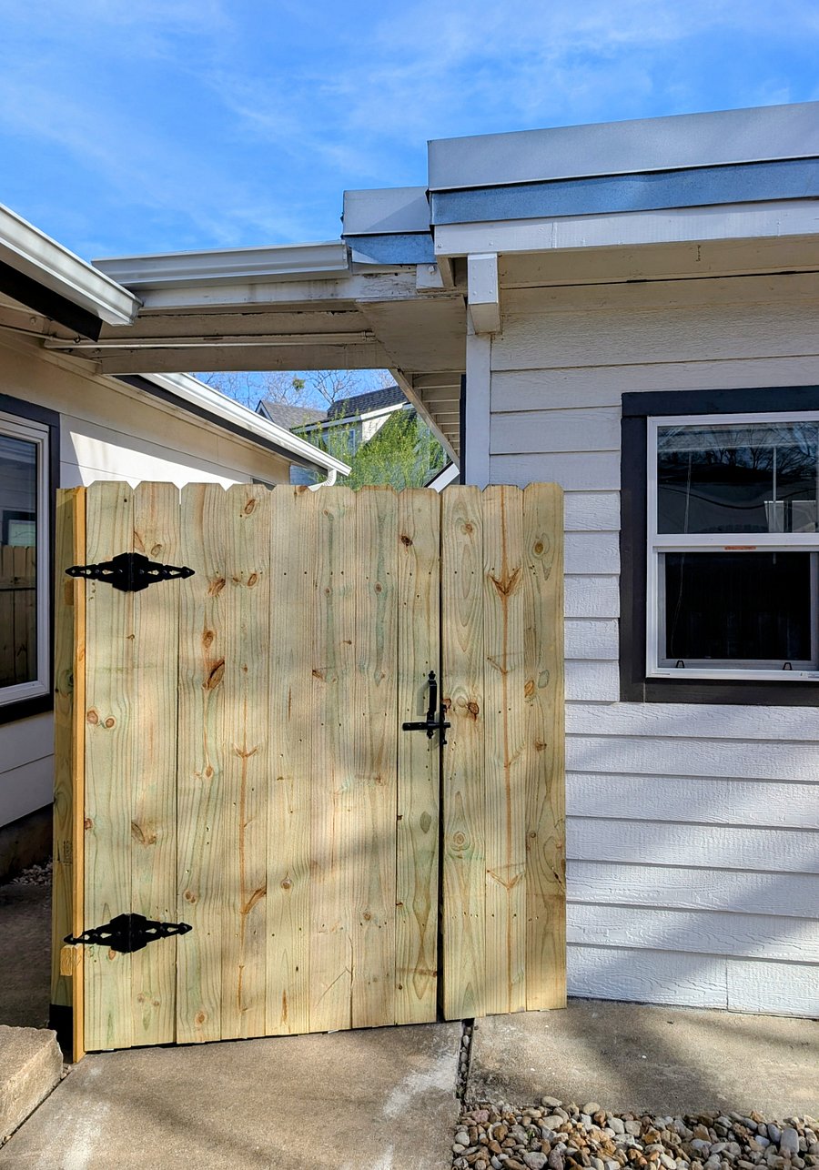 The gate leading to the front door of the unit provides additional privacy.