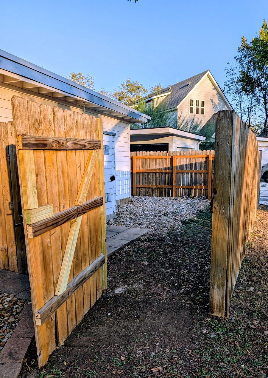 View from the driveway into the back yard