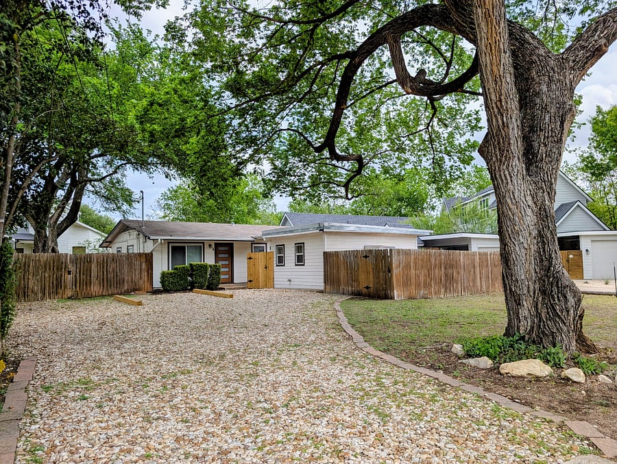 The tiny house sits on the front right of the property and is completely private and separate from the other unit on the property.