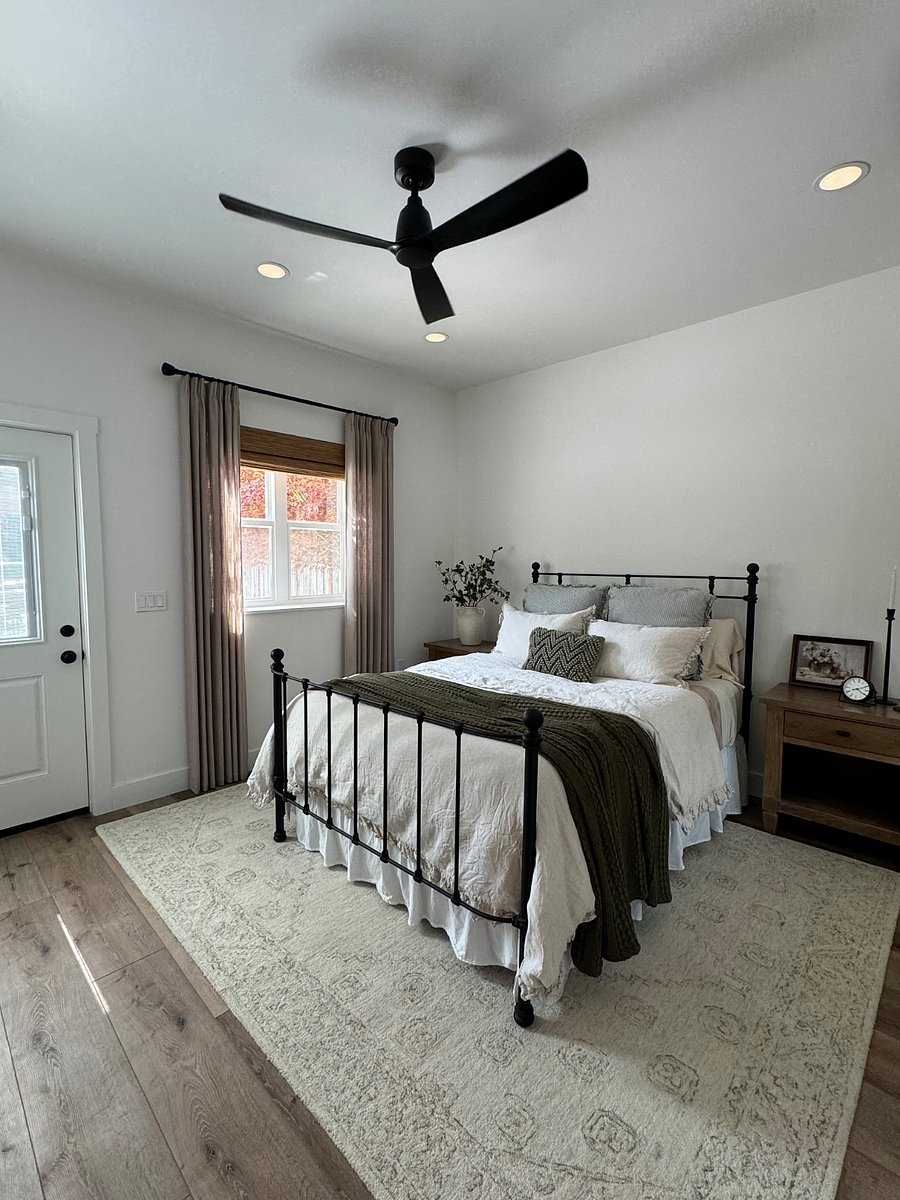 Bedroom has exterior door that leads to the beautiful backyard