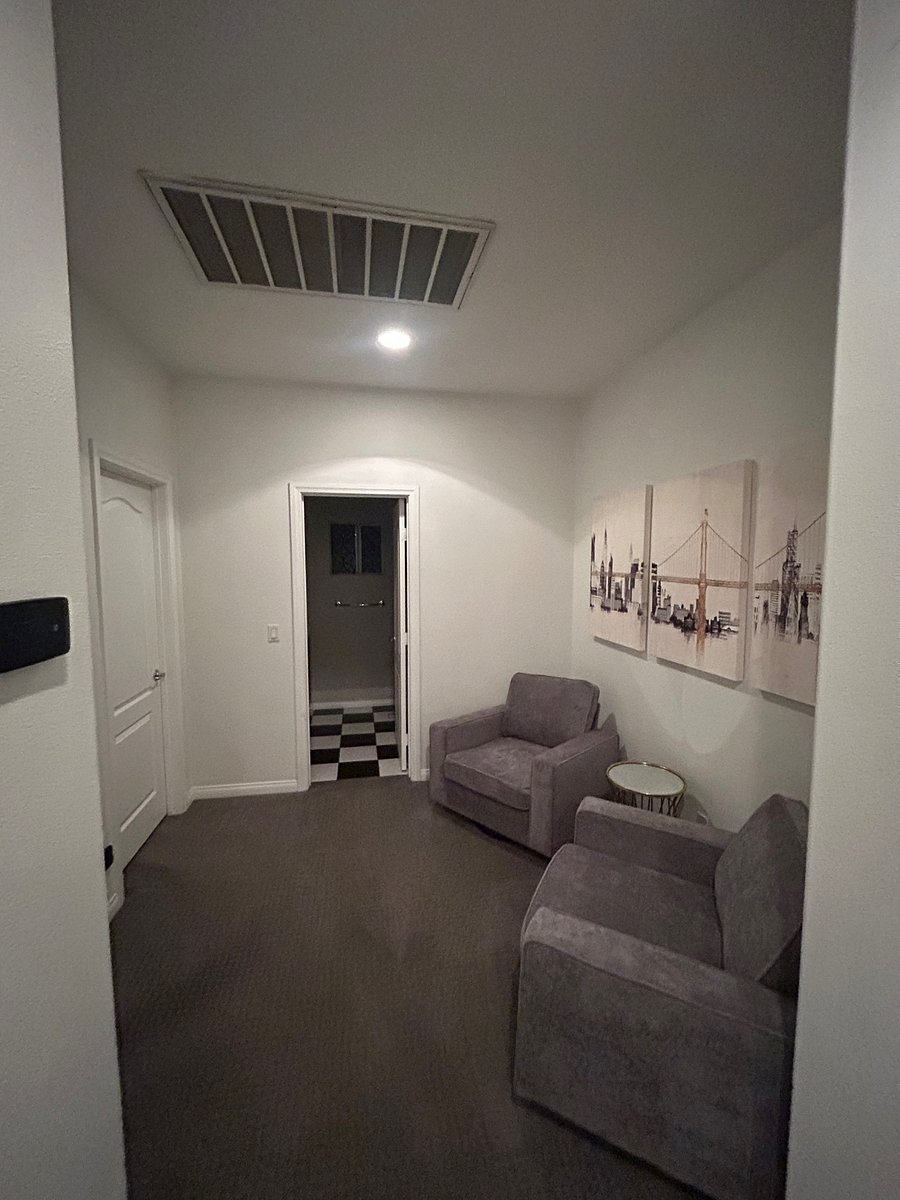 Sitting area across room 2 & 3, next to bathroom 