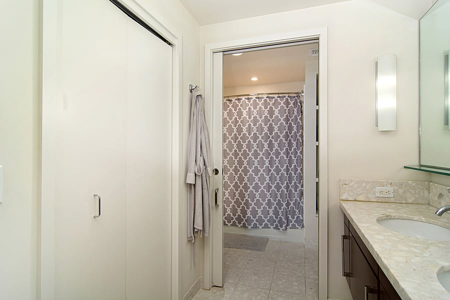 Master bedroom bathroom attached with double sinks bath/shower and walk in closet