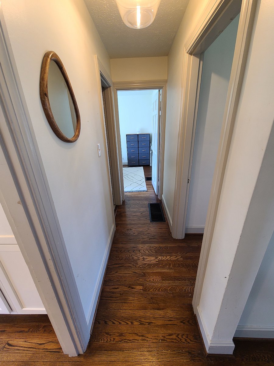 Bathroom to the left (right before the bedroom straight ahead)