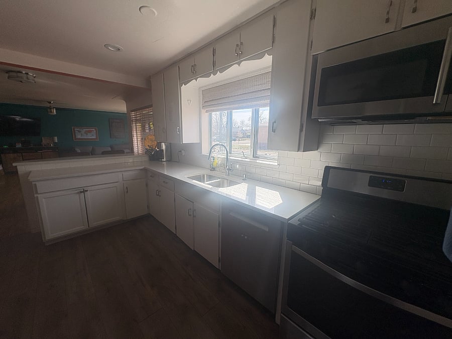 new marble counter tops, new fridge, new dishwasher.