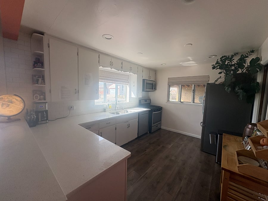 new marble counter tops, new fridge, new dishwasher.