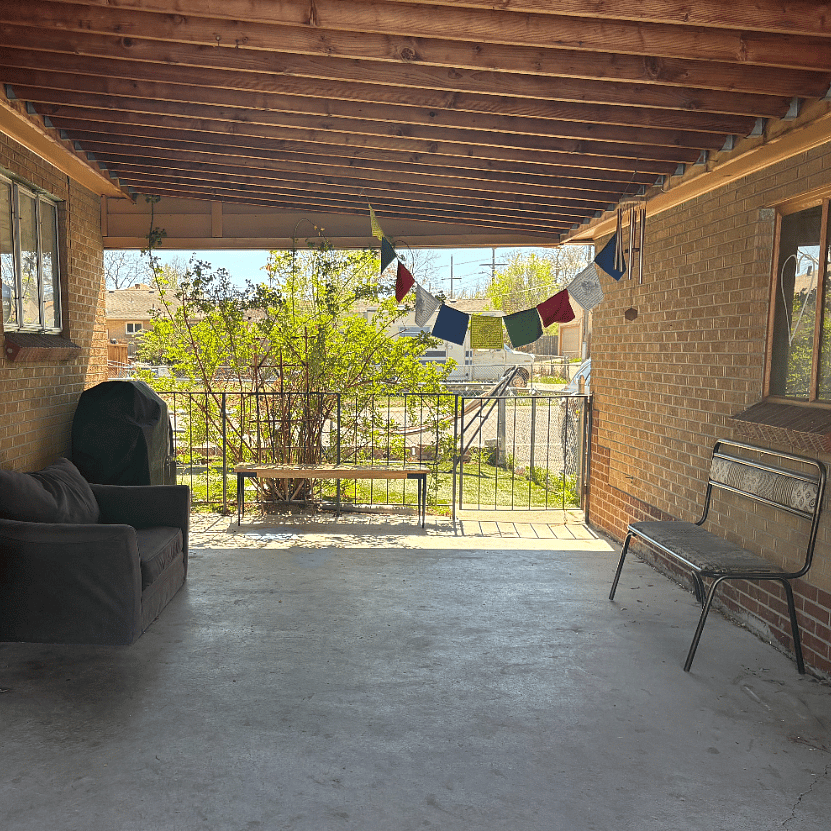 lovely spacious side outdoor patio, covered and wonderful for breezy shady afternoons and grilling!