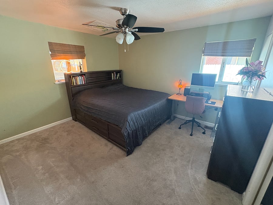 Primary Bedroom - Cali king (Purple mattress), tons of space and light, and blackout curtains!