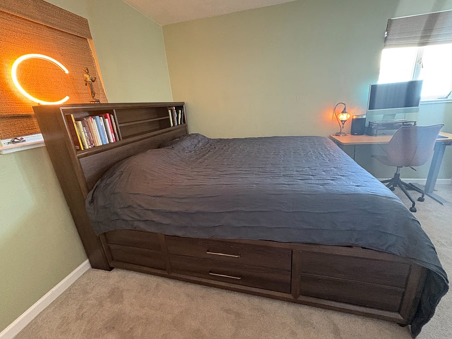 Primary Bedroom - Cali King (Purple Mattress), storage space under bed, and night lights from Rare Finds