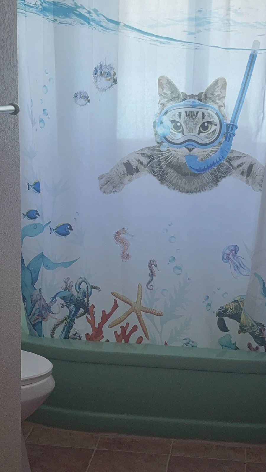 fun shower curtain in spacious bathroom :)