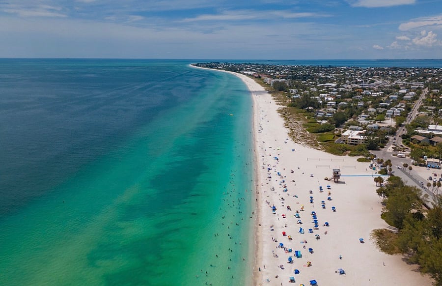 Anna Maria Island (AMI) just 10-15 minutes away, known for its stunning white-sand beaches, clear Gulf waters, and laid-back coastal charm-perfect for relaxing, dining, and catching beautiful sunsets.