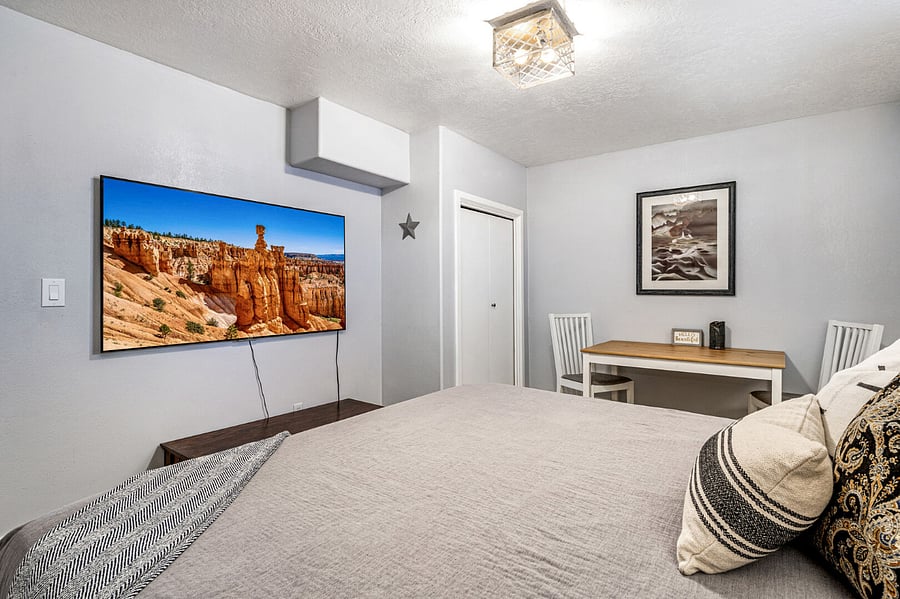 King Tuft & Needle mattress (no harmful chemicals) downstairs bedroom. Blackout curtains. Private desk/work station. Large smart TV with Amazon firestick. 