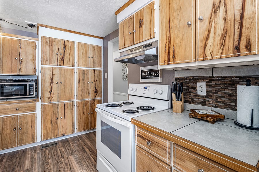 Well-stocked kitchen with everything you need to cook and serve delicious meals. Dishwasher, microwave, full size fridge, freezer, oven, stovetop. 