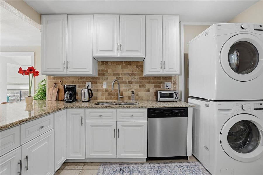 View of the kitchen with washer and dryer