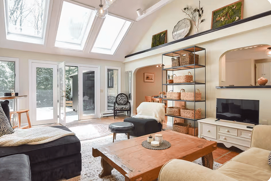 The spacious great room is the heart of the homebright, open, and filled with natural light from oversized skylights and vaulted ceilings. The airy design creates a seamless indoor-outdoor feel, while the gas fireplace adds warmth and comfort, making it just as inviting on cooler Cape Cod days. Its the perfect place to relax, unwind, or gather in a calm, sunlit space.