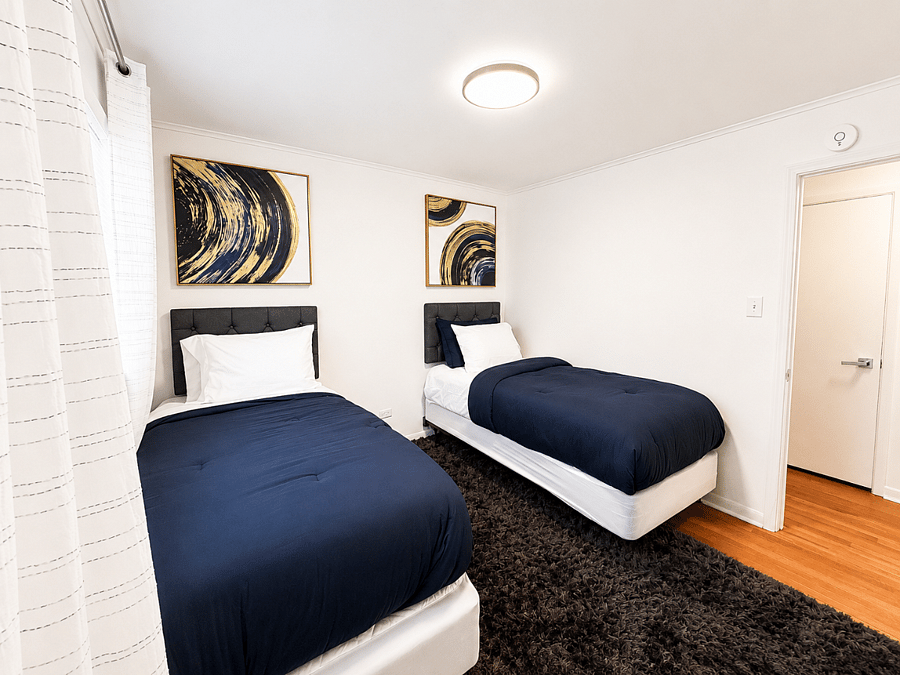 Twin bedroom ideal for teammates or children.
